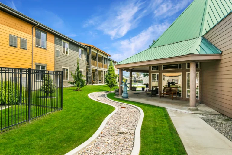 Photo of the outside of building and grounds of River Mountain Village Assisted Living